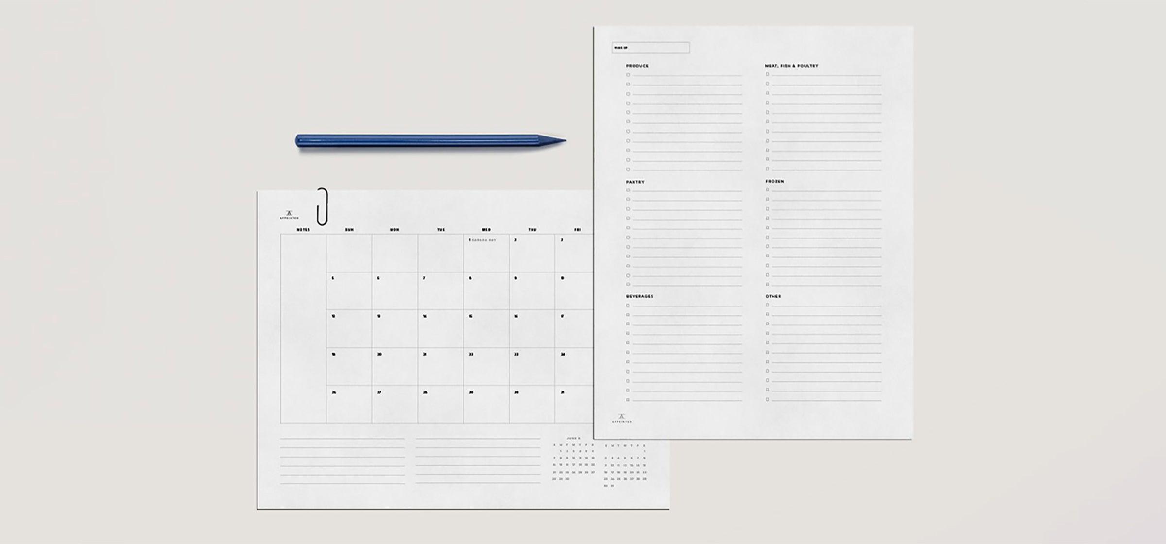 Two Appointed digital downloads and a pen sit against a light beige background