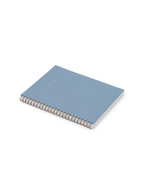 25-26 Weekly Grid Planner in Chambray Blue bookcloth with brass wire-o binding angle view || Chambray Blue 