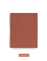 The Appointed 2024 Year Task Planner in Sienna with brass wire-o binding, foil details, and textured bookcloth covers || Sienna