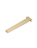 Angled view of the brass bookmark