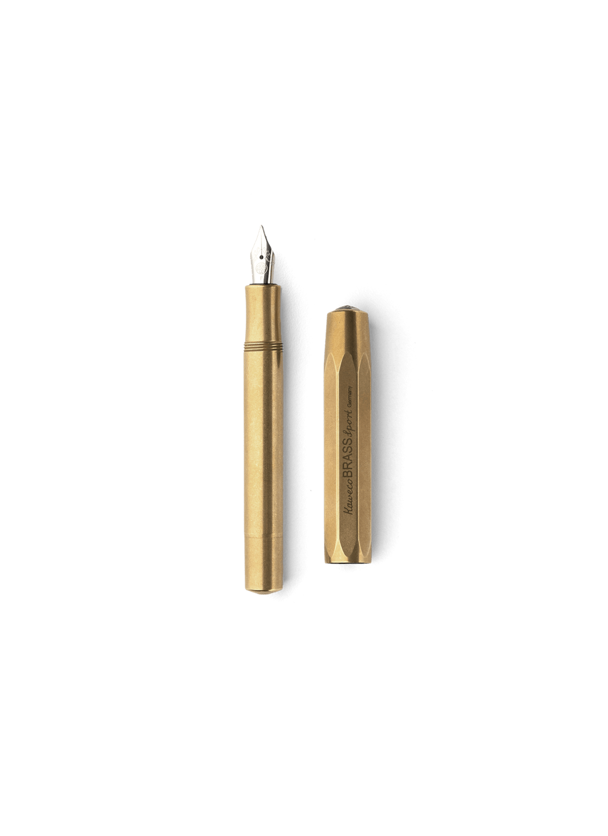 Brass Kaweco Fountain Pen with lid off and laying next to it