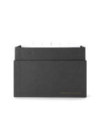 Eye-level view of desktop storage box, lid off showing dividers || Onyx