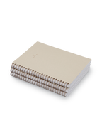 Appointed Notebook with bookcloth cover and brass wire-o binding side angle view